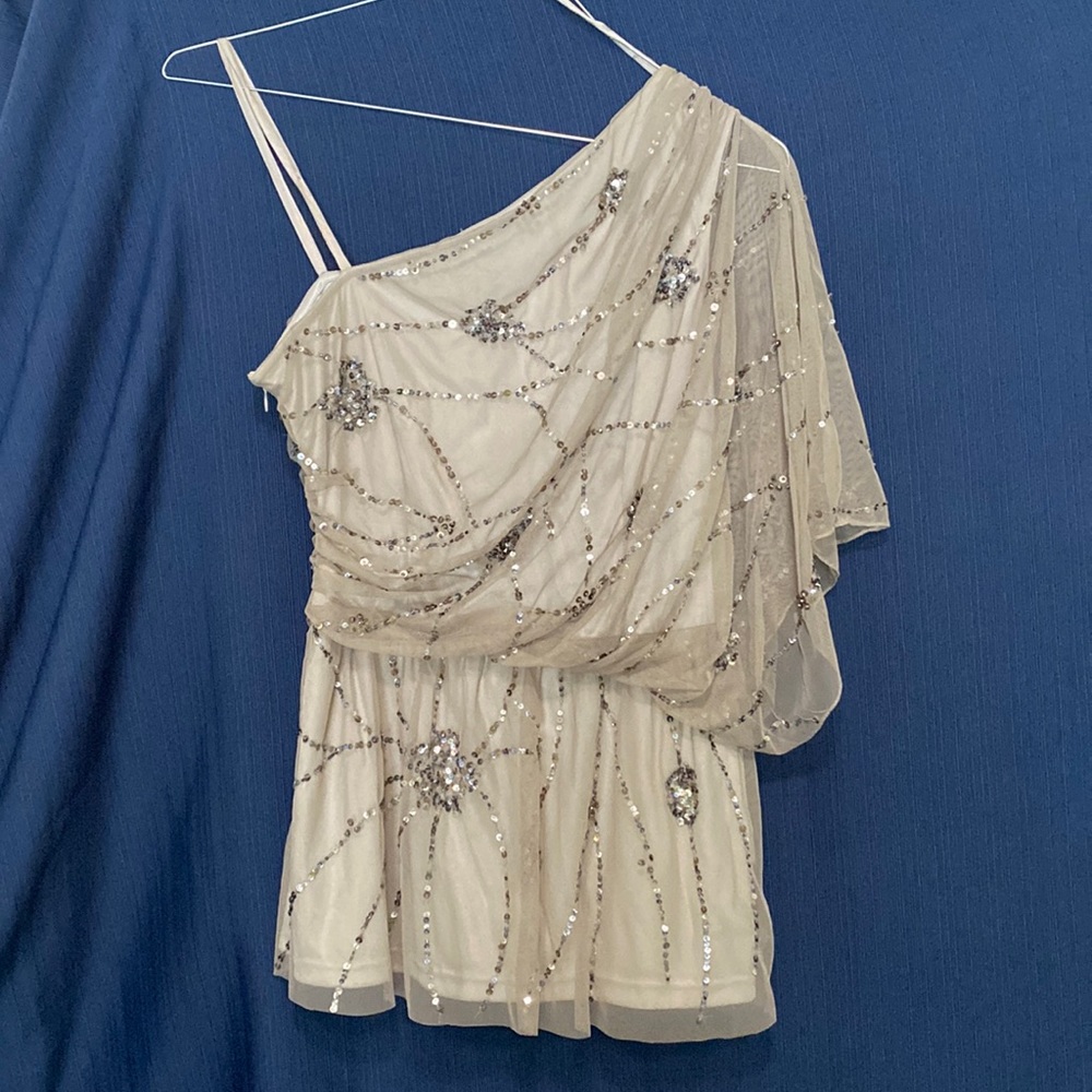 Elegant one shoulder dress blouse in great condition! Worn a handful of times!